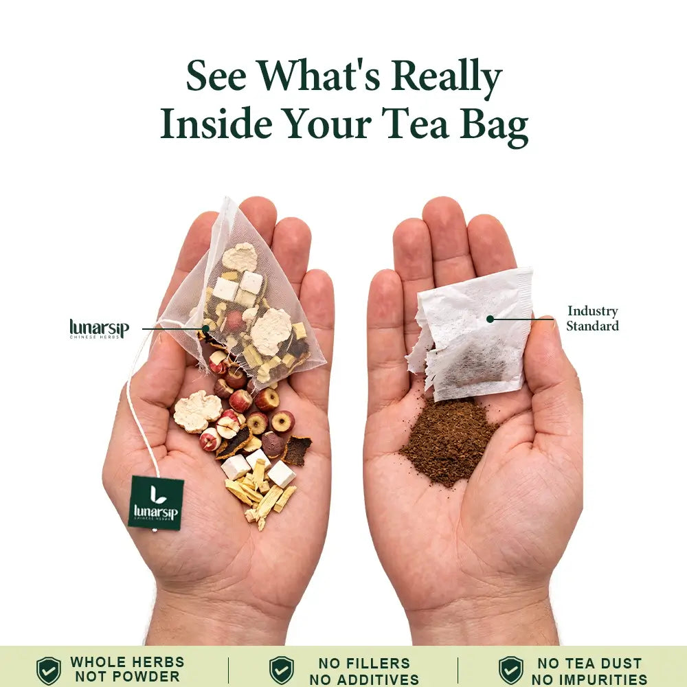 Hand holding a LunarSip gut health tea bag of whole herbs next to a powdered tea bag
