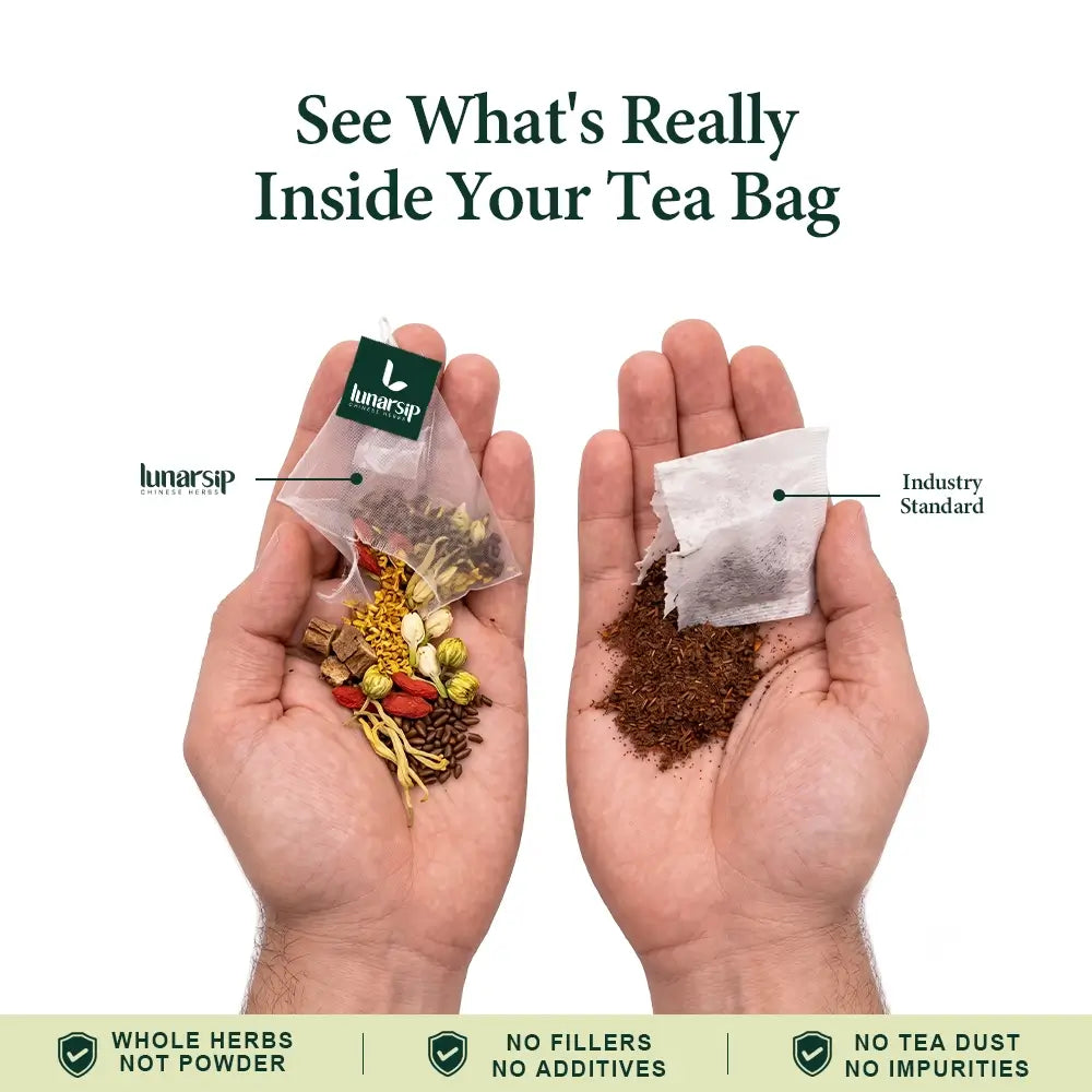 Hand holding a LunarSip liver detox tea bag of whole herbs next to a regular powdered tea bag