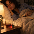 Woman sleeping peacefully after a cup of Sleep & Calm herbal sleep tea